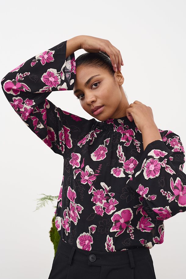 black blouse with red flowers